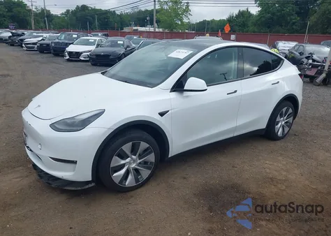 2023 Tesla Model Y из США, поврежденный, VIN 7SAYGDEE9PF684846